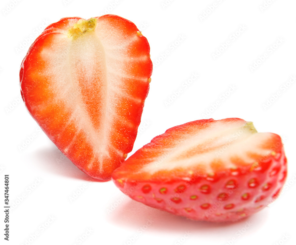 Strawberry. Cut strawberries into pieces. Strawberry slices flying in the air. Fresh natural strawberry isolated . Strawberry. Cut strawberries into pieces. Strawberry slices flying in the air. Fresh natural strawberry isolated .