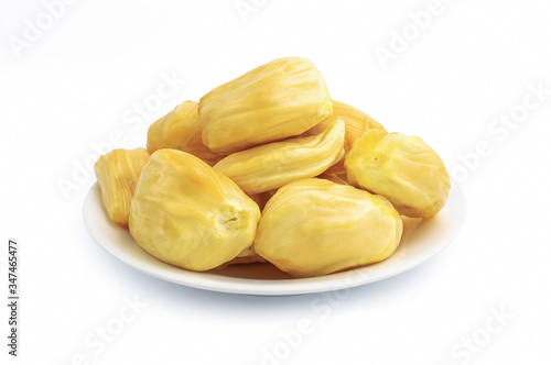 Close up of jack fruit on dish isolated on white background, clipping path included.