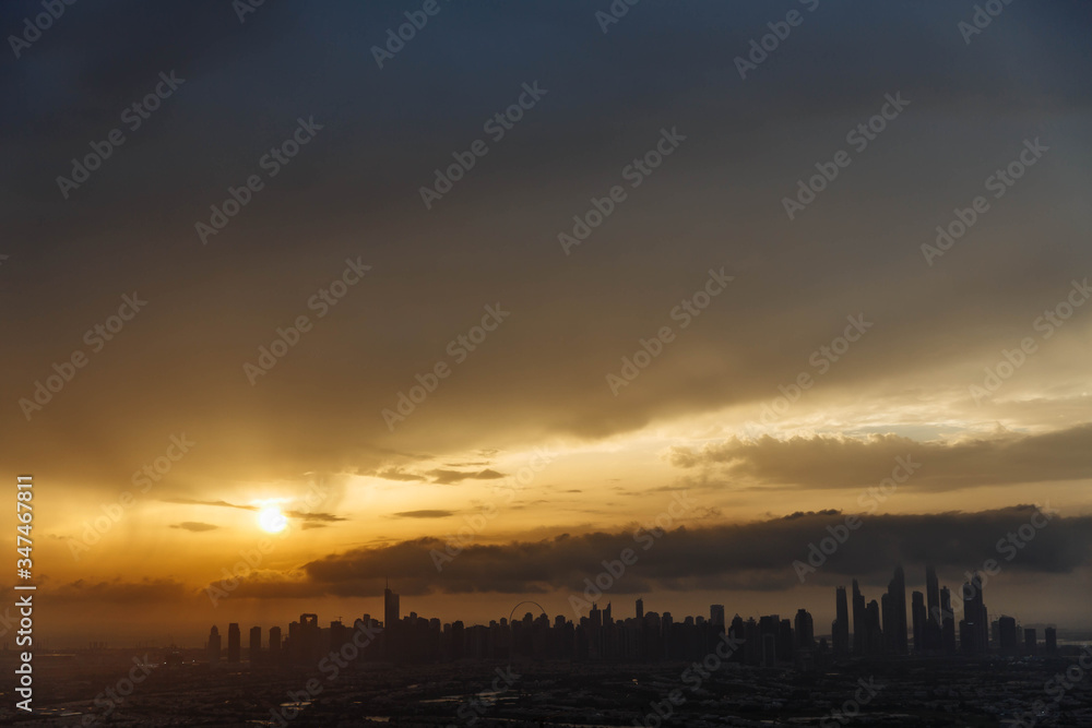 The beauty panorama of skyscrapers in Dubai Marina. UAE. Sunset over Dubai, aerial skyline. The beauty panorama of skyscrapers in Dubai Marina. UAE. Sunset over Dubai, aerial skyline.