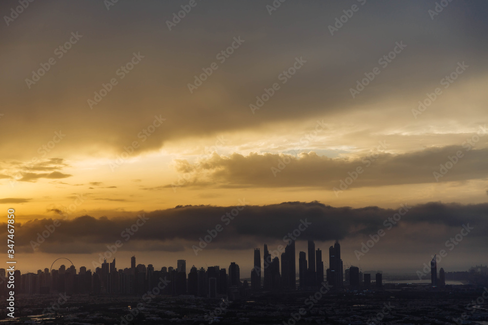 The beauty panorama of skyscrapers in Dubai Marina. UAE. Sunset over Dubai, aerial skyline. The beauty panorama of skyscrapers in Dubai Marina. UAE. Sunset over Dubai, aerial skyline.