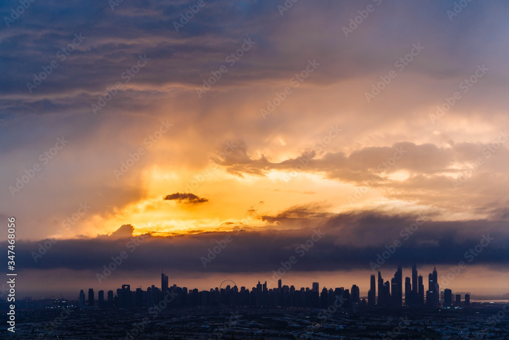 The beauty panorama of skyscrapers in Dubai Marina. UAE. Sunset over Dubai, aerial skyline. The beauty panorama of skyscrapers in Dubai Marina. UAE. Sunset over Dubai, aerial skyline.
