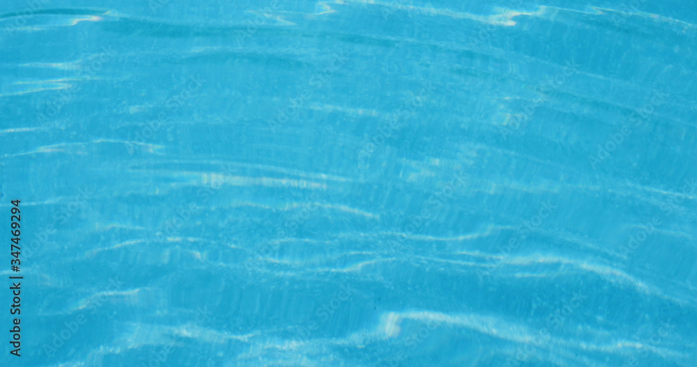 Obraz premium Swimming pool water texture in blue color