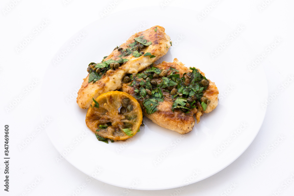 Italian food Lemon chicken Piccata with parsley