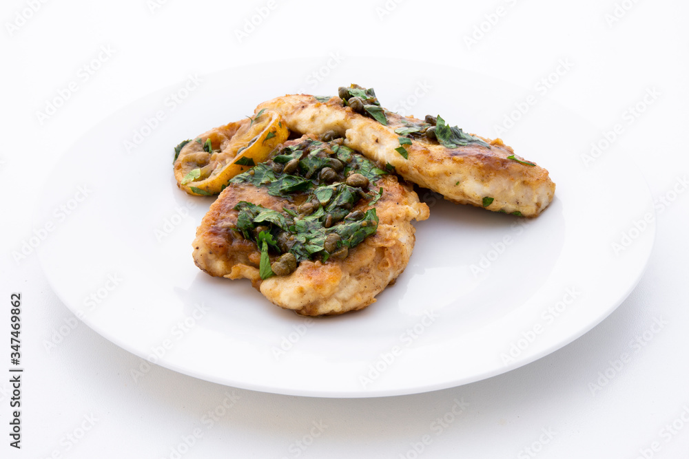 Italian food Lemon chicken Piccata with parsley