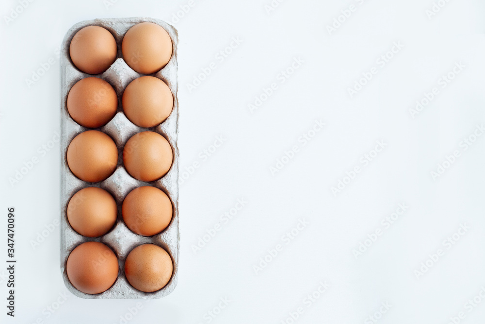 Organic chicken eggs - fresh from producer. Top view. Free space for text.
Organic chicken eggs - fresh from producer. Top view. Free space for text.