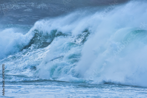 Detail of big waves in rough sea. On a cloudy day. Galicia Spain.