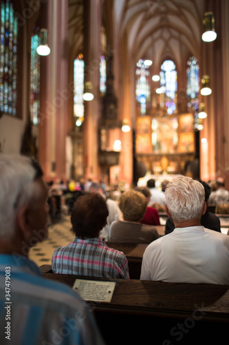 Schilderij op canvas People in a church during a mass