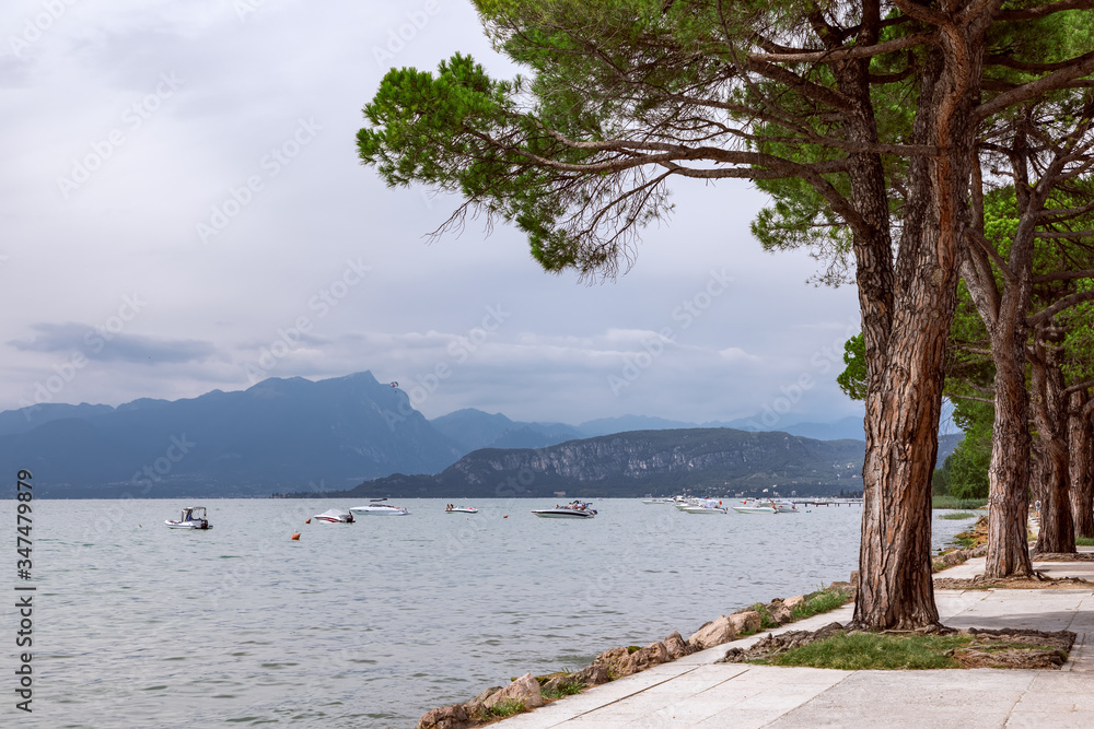 View of Lake Garda from the promenade between town Lazise and Bardolino.