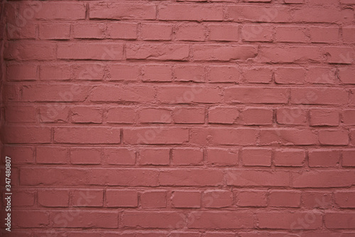 Texture of a painted red brick wall