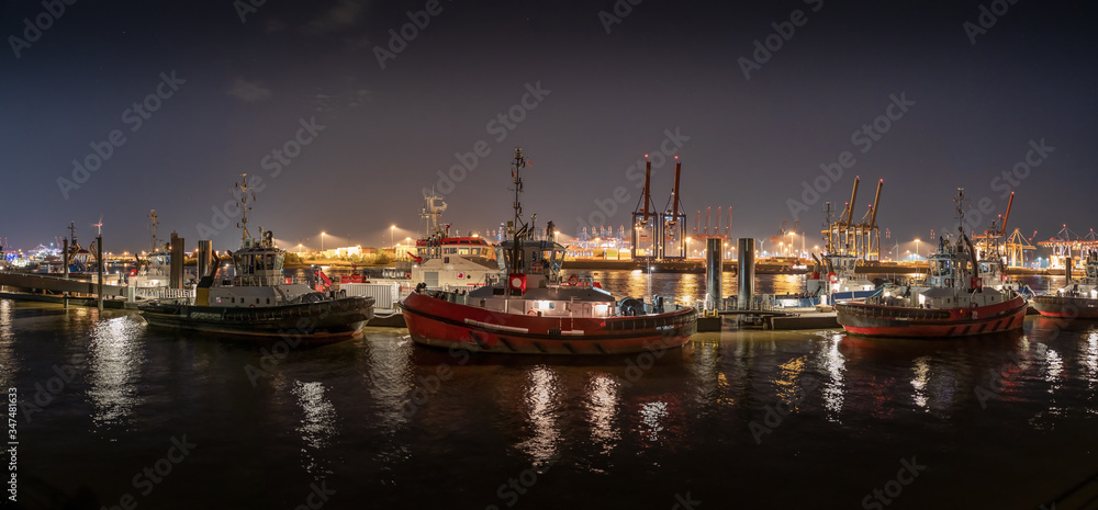 Hamburg harbour at night, with many lights