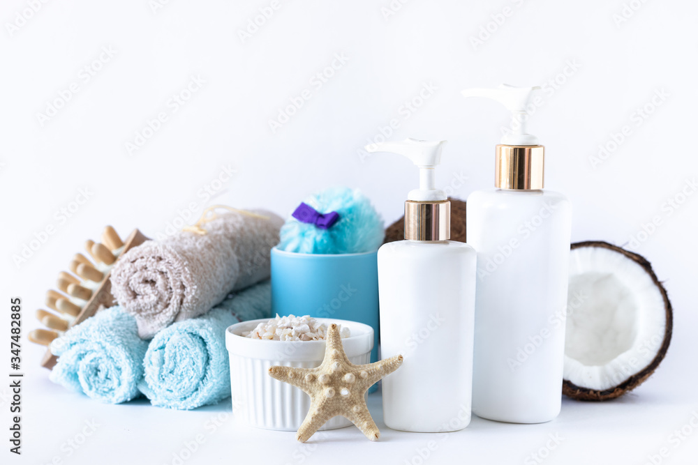 Natural organic spa cosmetics for body and face care with coconut oil. Zero waste. Skincare concept on white background. Copy space. Natural organic spa cosmetics for body and face care with coconut oil. Zero waste. Skincare concept on white background. Copy space.