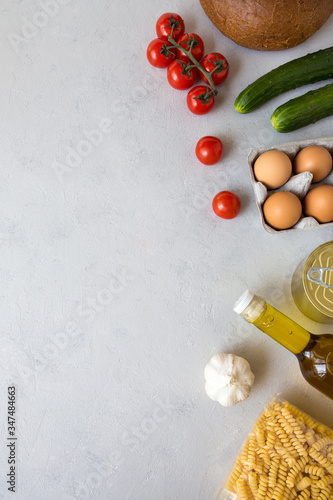 Set of grocery items on white background. Internet order of nutrition. Food delivery. Contactless online order of goods from the store. Takeaway products. Flat lay, copy space, white background