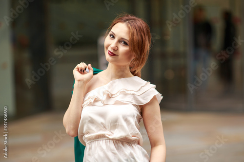 a pretty young woman posing