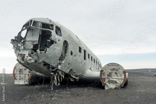 United states dc3 cargo plane wreck at Solheimasandur black lava beach in Iceland. photo