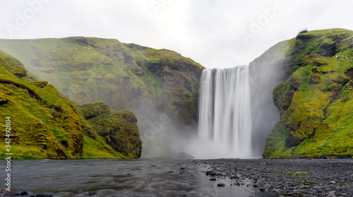 The beautiful Skogarfoss waterfall in Iceland early morning without people. Travelling and Icelandic concept.