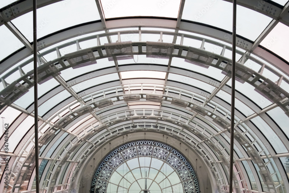 View of the transparent glass ceiling of a large light building interior