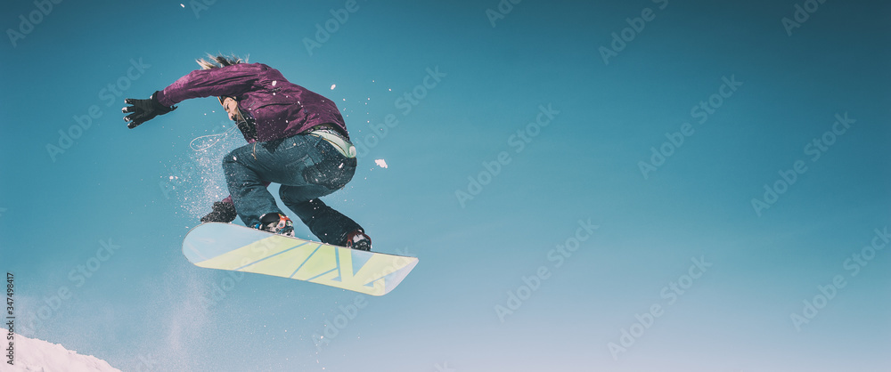 Freerider snowboarder doing speed trick air jump with his snowboard. Winter  mountain freeride foto de Stock | Adobe Stock