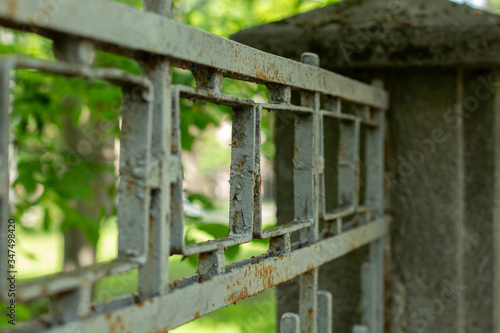 old metal rusty fence on the street vintage