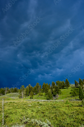 Storm clouds roll in over Yellowstone hill