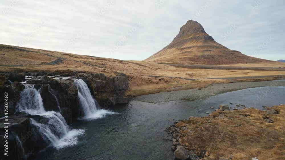 Kirkjufell is one of the most scenic and photographed mountains in Iceland all year around. Beautiful Icelandic landscape of Scandinavia. High resolution 4K footage Kirkjufell is one of the most scenic and photographed mountains in Iceland all year around. Beautiful Icelandic landscape of Scandinavia. High resolution 4K footage
