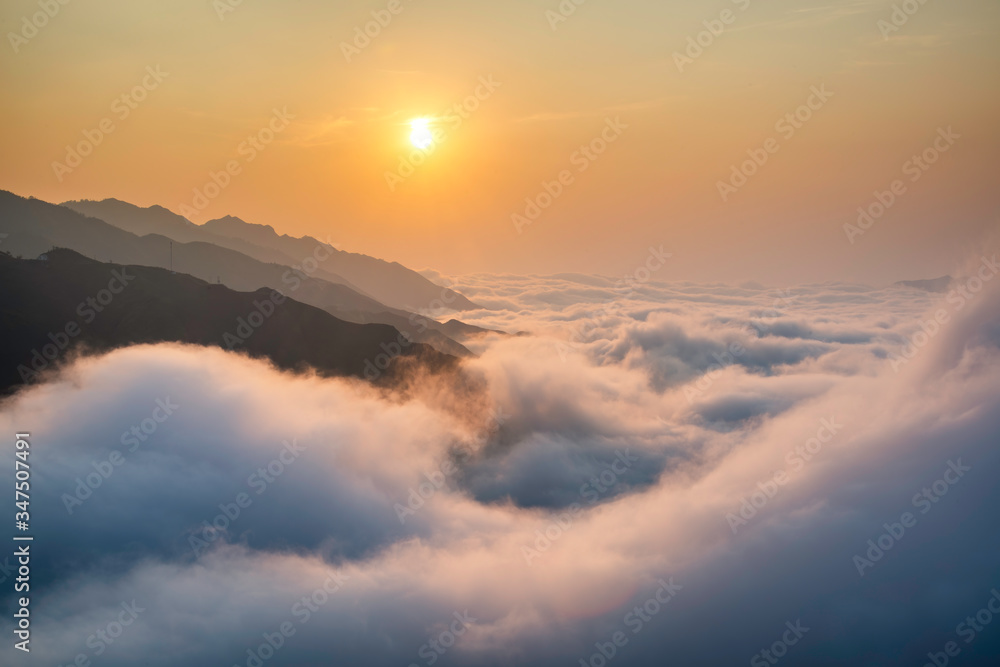Ta Xua is a famous mountain range in northern Vietnam. All year round, the mountain rises above the clouds creating cloud inversions. Ta Xua is a famous mountain range in northern Vietnam. All year round, the mountain rises above the clouds creating cloud inversions.