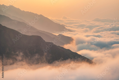 Ta Xua is a famous mountain range in northern Vietnam. All year round, the mountain rises above the clouds creating cloud inversions. © VietDung