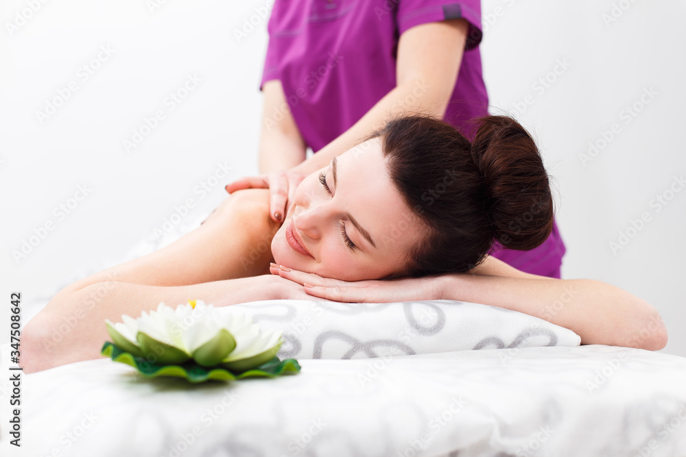 Beautiful brunette at the reception of a massage therapist Beautiful brunette at the reception of a massage therapist
