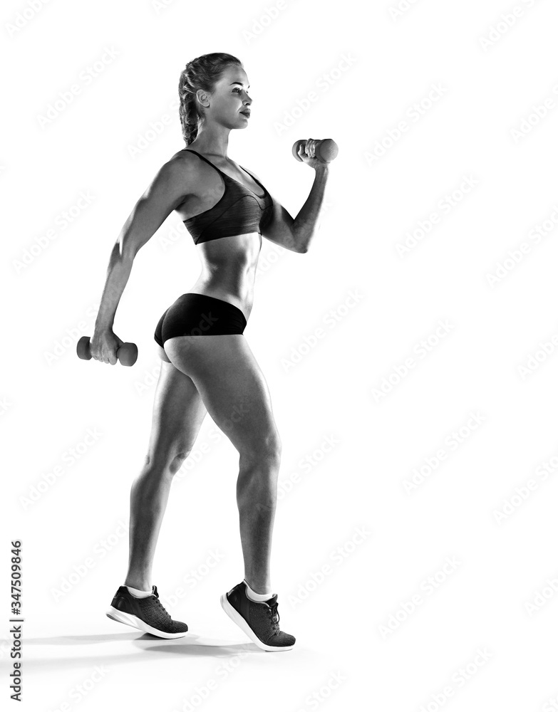 Sport backgrounds. Beautiful slim sporty young girl is preparing for joint training. The concept of sports lifestyle. Fitness concept. Sport backgrounds. Beautiful slim sporty young girl is preparing for joint training. The concept of sports lifestyle. Fitness concept.