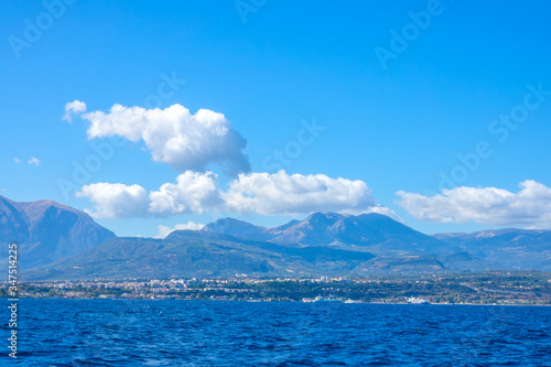 Mountainous Coast on a Sunny Summer Day and Clouds