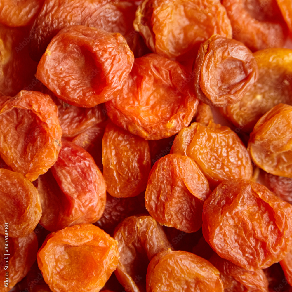 Dried apricots background. Heap of dry apricot fruits Dried apricots background. Heap of dry apricot fruits