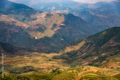 Ta Xua is a famous mountain range in northern Vietnam. All year round, the mountain rises above the clouds creating cloud inversions. photo