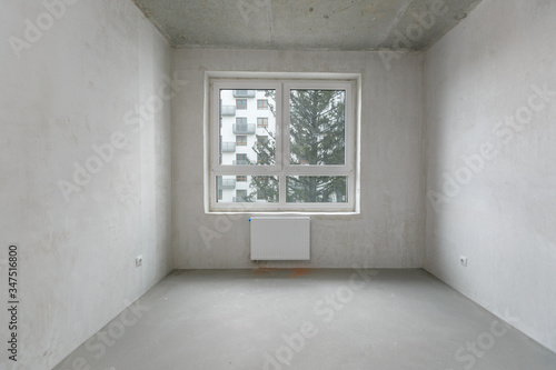 interior of the apartment without decoration in gray colors