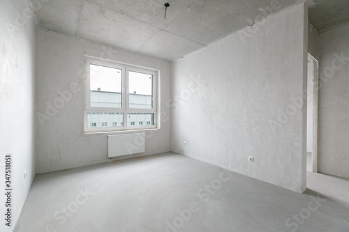 interior of the apartment without decoration in gray colors