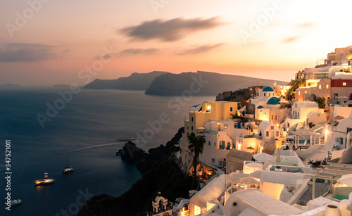 Sunset view of Oia and Caldera with Thirasia in the back, Santorini island, Cyclades, Greece