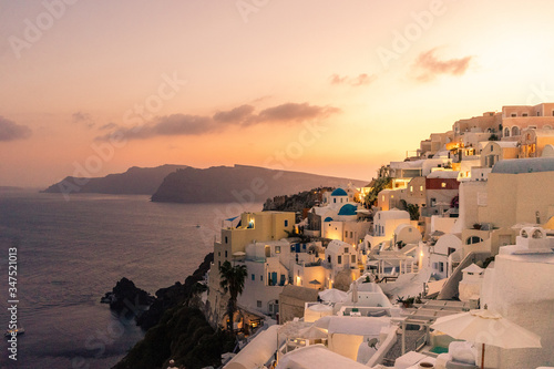 Sunset view of Oia and Caldera with Thirasia in the back, Santorini island, Cyclades, Greece
