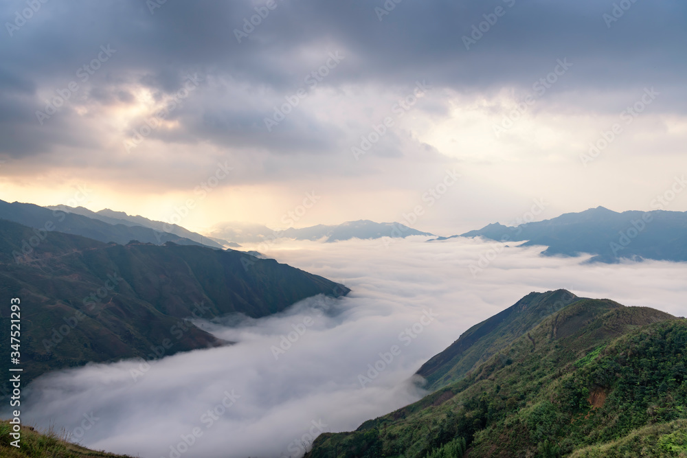 Ta Xua is a famous mountain range in northern Vietnam. All year round, the mountain rises above the clouds creating cloud inversions. Ta Xua is a famous mountain range in northern Vietnam. All year round, the mountain rises above the clouds creating cloud inversions.
