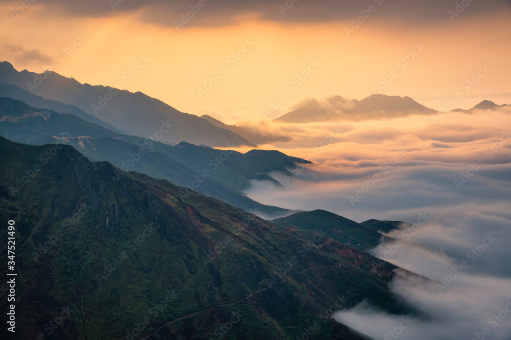 Ta Xua is a famous mountain range in northern Vietnam. All year round, the mountain rises above the clouds creating cloud inversions. Ta Xua is a famous mountain range in northern Vietnam. All year round, the mountain rises above the clouds creating cloud inversions.