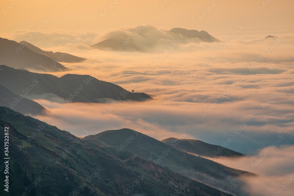 Ta Xua is a famous mountain range in northern Vietnam. All year round, the mountain rises above the clouds creating cloud inversions. Ta Xua is a famous mountain range in northern Vietnam. All year round, the mountain rises above the clouds creating cloud inversions.