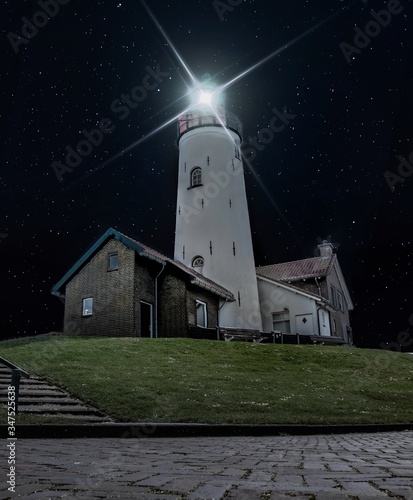 A lighthouse during clear night