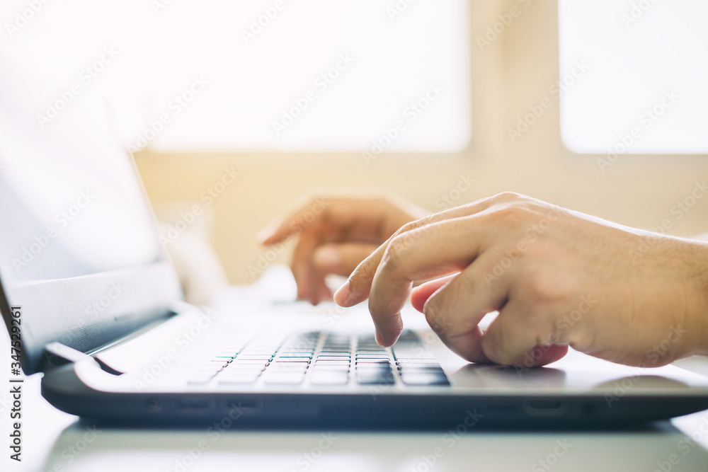Businessman working with computer laptop. Close up picture of journalist typing on laptop for writing new article in website. Concept for chatting, working and online education. Businessman working with computer laptop. Close up picture of journalist typing on laptop for writing new article in website. Concept for chatting, working and online education.