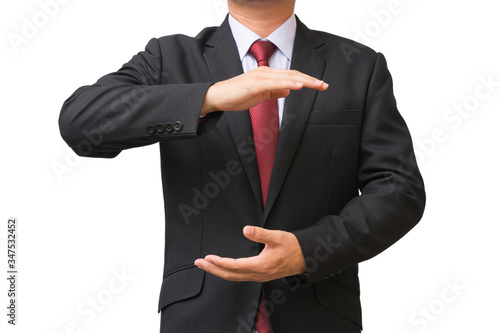 Businessman act his hand to protect something which isolated on white background