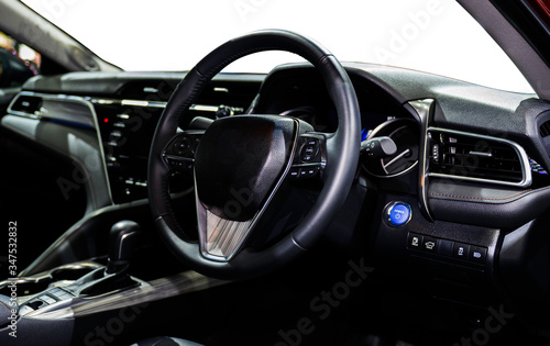interior luxury of modern car with Black leather steering wheel