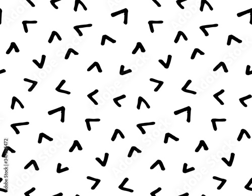 Hand drawn scattered zigzag marks seamless pattern. Tileable texture with freehand jumble of triangle lines. Monochrome background for wrapping paper, textile print, scrapbooking pages.