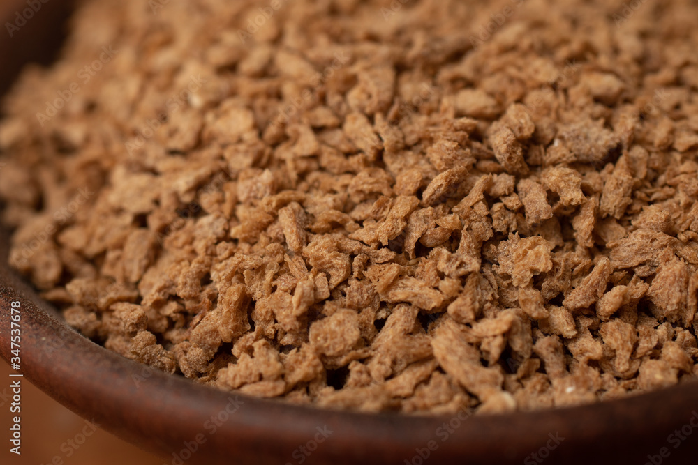 Raw Soya Mince. Textured Soy. Meat Substitute in a bowl Raw Soya Mince. Textured Soy. Meat Substitute in a bowl