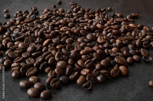 coffee beans on burlap background black background  gray 