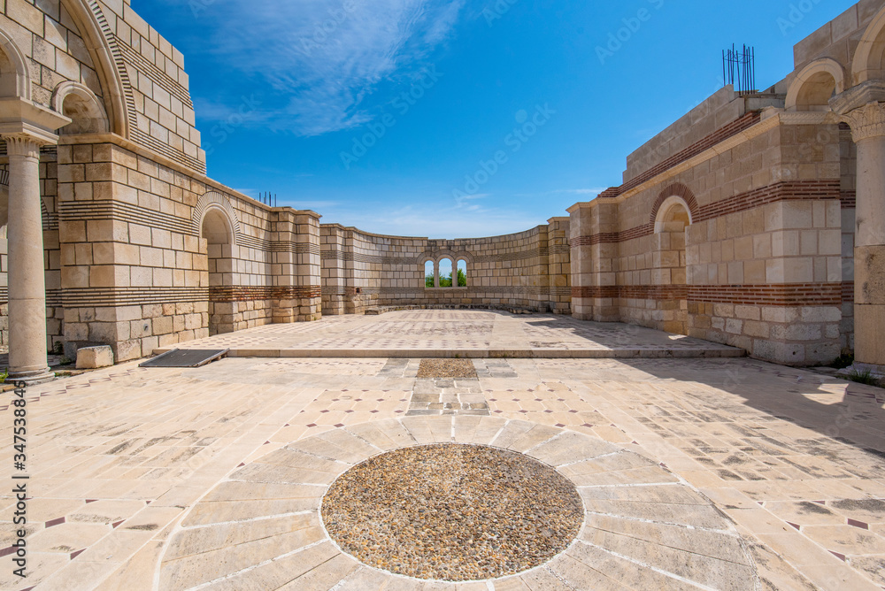 Obraz premium Pliska, Bulgaria and the The Great Basilica - largest Christian cathedral in medieval Europe near The capital city of the First Bulgarian Empire. 