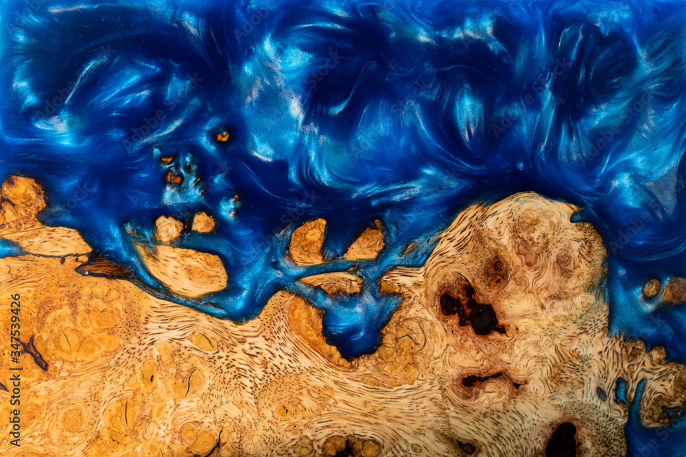 Casting epoxy resin stabilizing maple wood background texture Stock