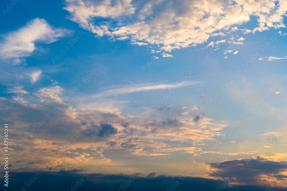 Fototapeta premium blue sky with golden orange cloud sunset