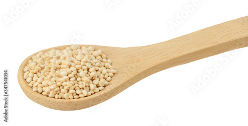 white quinoa seeds in wooden spoon isolated on white background with clipping path and full depth of field.