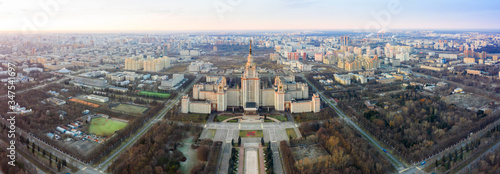 Aerial view of Moscow State University on Sparrow Hills, Moscow, Russia. Scenic panorama of Moscow with the Main building of MSU from above. © miklyxa